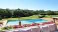 Toscana Immobiliare - pool of the elegant villa in sardinia surrounded by a luxuriant garden with swimming pool