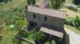 Toscana Immobiliare - Casale in pietra con 3 ha di terreno e vista sulla campagna,