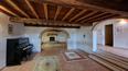 Toscana Immobiliare - Renoviertes Luxus-Bauernhaus mit Olivenhain und Nebengebäude in der Toskana zu verkaufen.