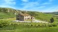 Toscana Immobiliare - Farmhouse with renovated farmhouse, annexes and 1.5 ha land for sale in the Crete Senesi, Tuscany