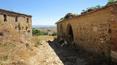 Toscana Immobiliare - casale con annesso in pietra e mattoni da ristrutturare a torrita di siena con vista su montepulciano e montefollonico