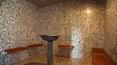 Toscana Immobiliare - sauna; proprietà in vendita a Bucine con casali ristrutturati, piscine, campi da tennis e calcio e con azienda agricola avviata; Tuscany, property for sale with restored farmhouses, swimming pool, football pitch and farm estate