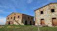 Toscana Immobiliare - casolari toscani in vendita ad asciano da ristrutturare costruiti con tipica pietra bianca locale e mattoni; farmhouse to renovate on sale in asciano made of typical whitr local stone and brick