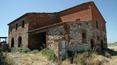 Toscana Immobiliare - casale in mattoni da ristrutturare in vendita con 2 ettari di terreni seminativi ed annessi agricoli; gfarmhouse to be restored for sale with 2 hectars of sowed fields and rural farm annexes