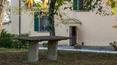 Toscana Immobiliare - The gorgeous façade overlooking the garden features two classical pilasters with reliefs