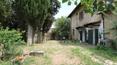 Toscana Immobiliare - garden of the farmhouse near siena