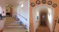 Toscana Immobiliare - staircases of the elegant villa in sardinia surrounded by a luxuriant garden with swimming pool