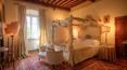 Toscana Immobiliare - bedroom of the luxury villa for sale in Cortona with swimming pool