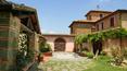 Toscana Immobiliare - The main country house together with its guest house cover a surface of 400 sqm. for a total of six bedrooms and four bathrooms, plus garage and portico