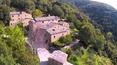 Toscana Immobiliare - With its 21 fully restored and serviced residences the Hamlet is serenely nestled amongst olive groves inthe rolling Tuscan hills