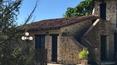 Toscana Immobiliare - The property consists of four stone faceted buildings of a total of 1600 sqm with spacious relax area, pool, gardens, pine forests, groves and orchards.