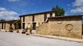 Toscana Immobiliare - The property consists of four stone faceted buildings of a total of 1600 sqm with spacious relax area, pool, gardens, pine forests, groves and orchards.