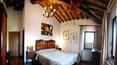 Toscana Immobiliare - bedroom of the farmhouse for sale in Siena, Asciano