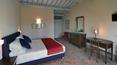 Toscana Immobiliare - bedroom of the winery for sale in Siena in Tuscany