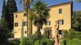 Toscana Immobiliare - The exclusive property for sale in Siena consists of a large luxury villa and a village, both in a Tuscan style