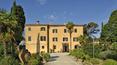 Toscana Immobiliare - The farm for sale in Tuscany includes a restored village with 22 apartments, a villa, swimming pool and 65 hectares of land
