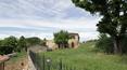Toscana Immobiliare - Overall, the property has a large courtyard with 14 covered parking spaces and an artesian well