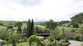 Toscana Immobiliare - the property has a large courtyard with 14 covered parking spaces and an artesian well