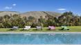 Toscana Immobiliare - panoramic swimming pool of the prestigious property for sale in Montalcino