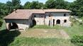 Toscana Immobiliare - Typical Tuscan stone farmhouse for sale Torrita di Siena