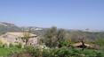 Toscana Immobiliare - Farmhouse to be restored for sale in Civita di Bagnoregio with a panoramic view of the town of Civita