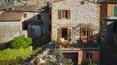 Toscana Immobiliare - For sale in Tuscany, province of Siena, renovated townhouse with garden and terrace