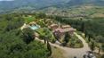 Toscana Immobiliare - Tuscan hamlet renovated in Greve in Chianti for sale