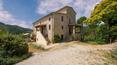 Toscana Immobiliare - Village with farmhouses, swimming pools and land for sale in Umbria