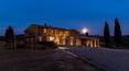 Toscana Immobiliare - Farm with vineyard and farmhouse for sale in Val D'Orcia, Tuscany