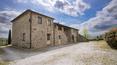 Toscana Immobiliare - Stone country house for sale divided into 3 apartments with swimming pool, park of 2 hectars. Arezzo real estate.