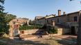 Toscana Immobiliare - Ancient village with winery for sale in Tuscany, Arezzo. luxury real estate properties in Italy with villa villa, church, 130 ha of land, houses