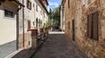 Toscana Immobiliare - Ancient village with winery for sale in Tuscany, Arezzo. luxury real estate properties in Italy with villa villa, church, 130 ha of land, houses