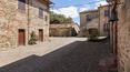 Toscana Immobiliare - Ancient village with winery for sale in Tuscany, Arezzo. luxury real estate properties in Italy with villa villa, church, 130 ha of land, houses