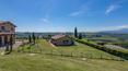 Toscana Immobiliare - The farm of 125 hectares consists of three buildings: a brick farmhouse, developed on 2 floors and divided into two specular flats, a smaller house divided into 2 more flats and a farmhouse to be restored. 