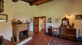 Toscana Immobiliare - In the living room on the ground floor there is a large fireplace.