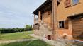Toscana Immobiliare - A typical external stone staircase leads to the main flat consisting of a large living area with double living room, kitchen, hallway, three bedrooms, two bathrooms, study and laundry room.