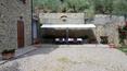 Toscana Immobiliare - Il giardino è poco più di 2,5 ha su vari terrazzamenti ed ha numerosi ulivi (circa 700), un grande garage, una piscina ed alcuni patio da utilizzare per mangiare all’aperto.