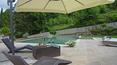 Toscana Immobiliare - Both infinity pools have travertine solariums