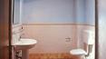 Toscana Immobiliare - 12th century property with 14 ha of land, 3 buildings, 6 apartments, 11 bedrooms, 10 bathrooms and pool for sale in Rufina, Florence, Tuscany.