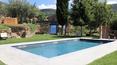 Toscana Immobiliare - Enclavada en las colinas toscanas, esta prestigiosa casa de campo con piscina está a la venta en Cortona