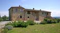 Toscana Immobiliare - Prestigious farmhouse immersed in the Tuscan hills, located in a panoramic and privileged position.
