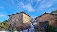Toscana Immobiliare - House with land and outbuildings for sale in Val d'Orcia Tuscany