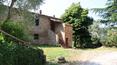 Toscana Immobiliare - El cortijo está construido en el típico estilo toscano, con una fachada de piedra mezclada con ladrillo