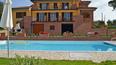 Toscana Immobiliare - Next to the large wooden porch with barbecue, there is a 6x12 pool and a 4000 sqm garden with olive grove
