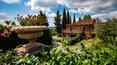 Toscana Immobiliare - Farmhouse for sale among the hills covered with vineyards and olive groves in Valdichiana