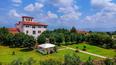 Toscana Immobiliare - The villa is surrounded by a large park with century-old trees and fruit trees and embellished by a beautiful glass veranda