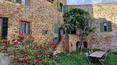 Toscana Immobiliare - Stone building with panoramic garden for sale in Montisi Trequanda Siena Tuscany