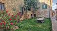 Toscana Immobiliare - Stone building with panoramic garden for sale in Montisi Trequanda Siena Tuscany