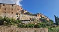 Toscana Immobiliare - Stone palace with garden for sale in Montisi Siena Tuscany