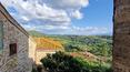 Toscana Immobiliare - Stone palace with garden for sale in Montisi Siena Tuscany